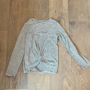 Gray and white stripped no stained cat and jack shirts with a tie in the front